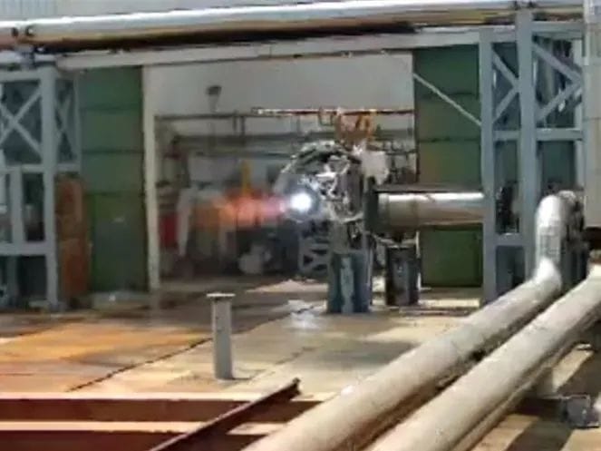 A YF-75E during a test firing on its stand. ©China Academy of Space Technology