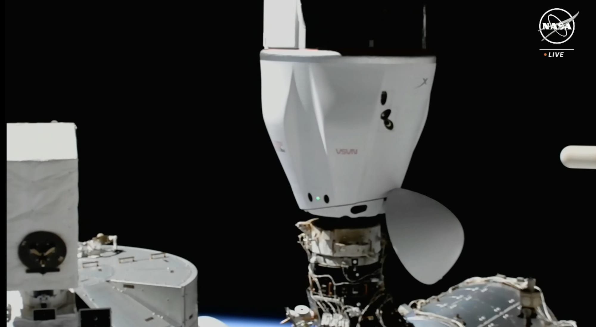 SpaceX's C209 Cargo Dragon V2 spacecraft during docking to the International Space Station. ©SpaceX/NASA