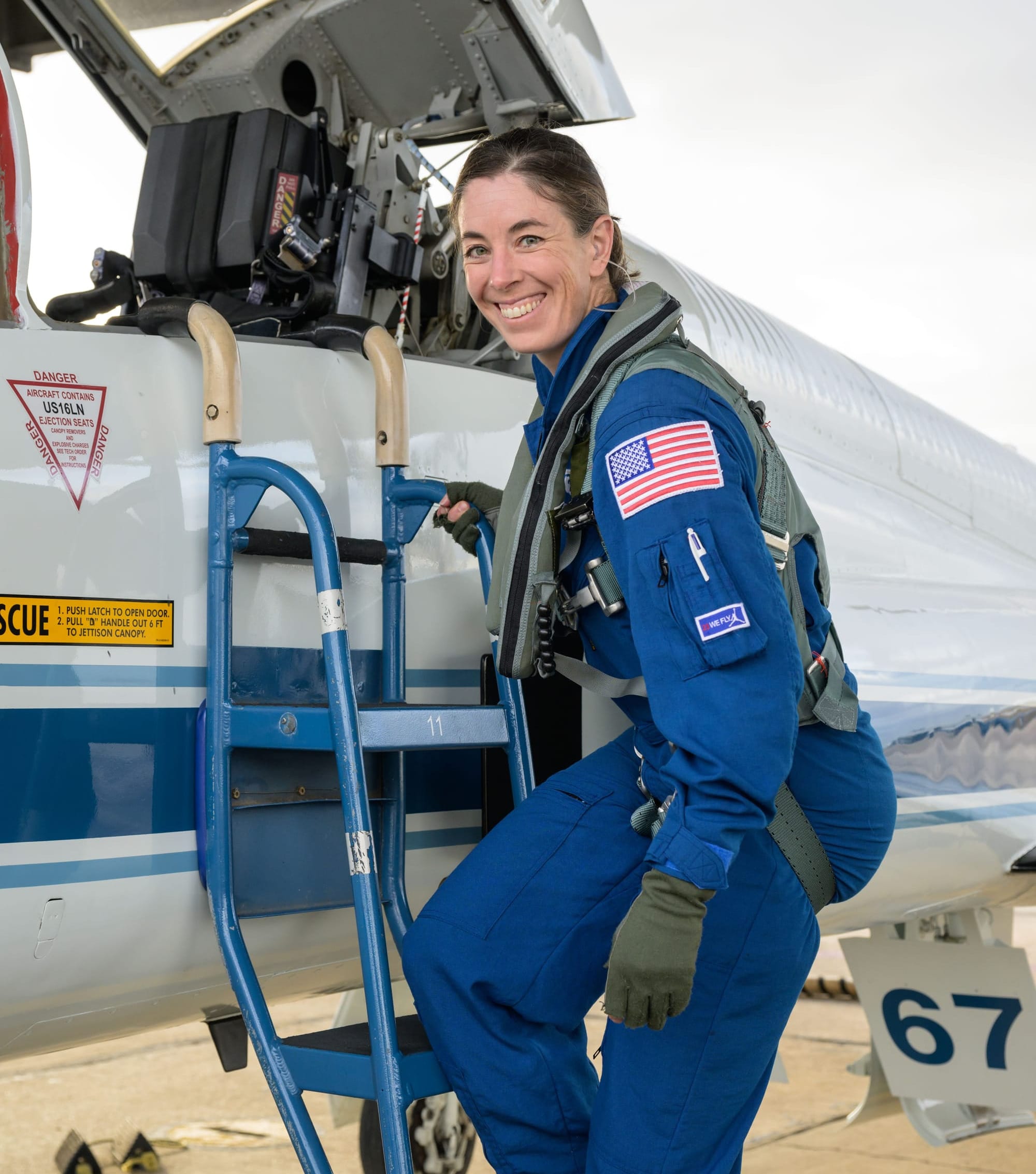 Chris Birch boarding a T-38 aircraft. ©NASA