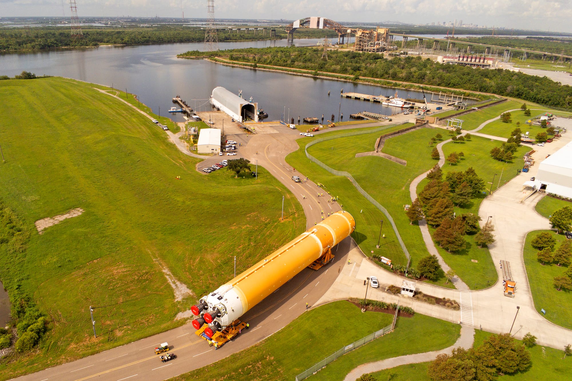 The Artemis II Space Launch System core stage being moved toward NASA's Pegasus barge. ©Eric Bordelon/Michael DeMocker/NASA