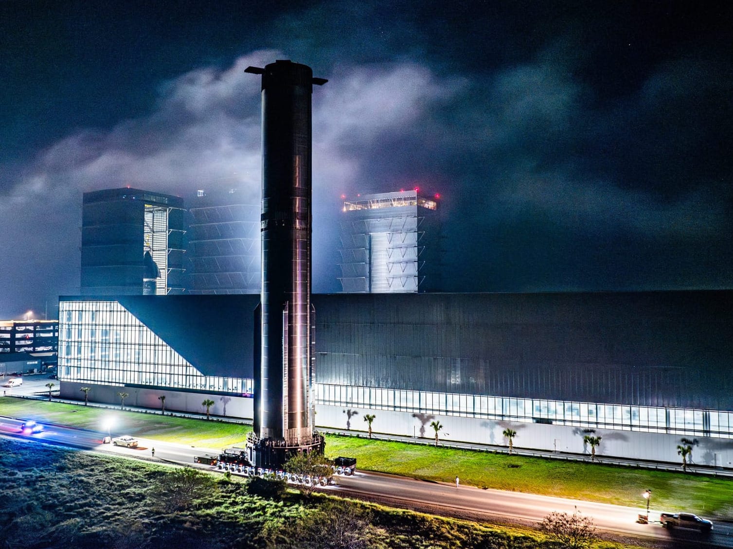 Booster 15 during rollout for testing at the launch site.©SpaceX