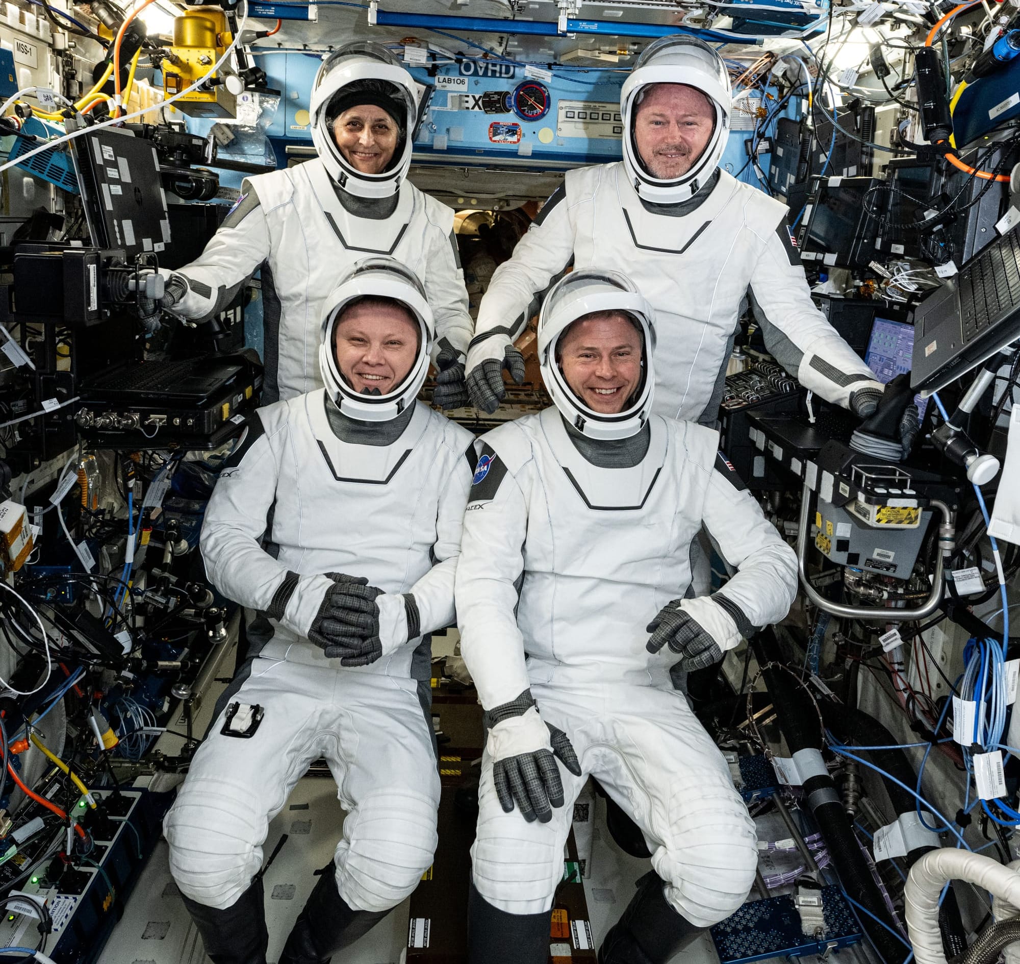 The Crew-9 astronauts in their SpaceX spacesuits ahead of their departure from the station; Suni Williams (top left), Butch Wilmore (top right), Aleksandr Gorbunov (bottom left), and Nick Hague (bottom right). ©NASA
