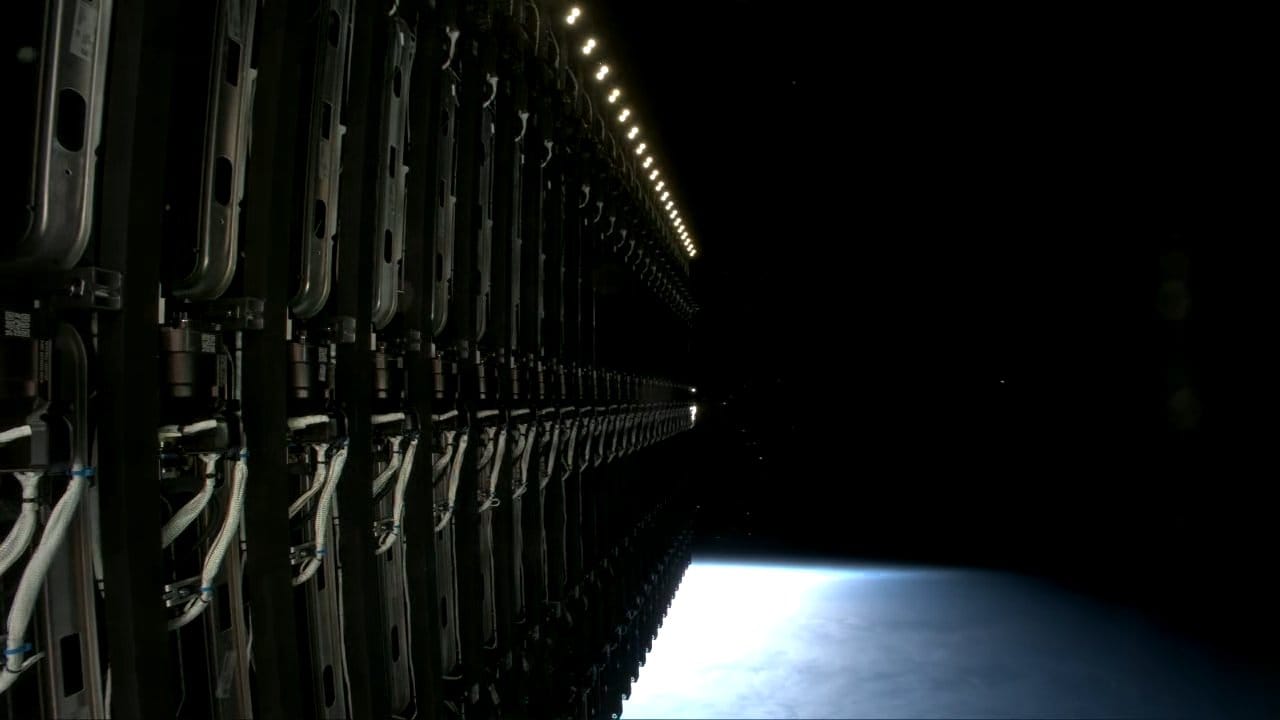 Twenty-eight Starlink satellites being deployed from Falcon 9's second-stage in orbit. ©SpaceX