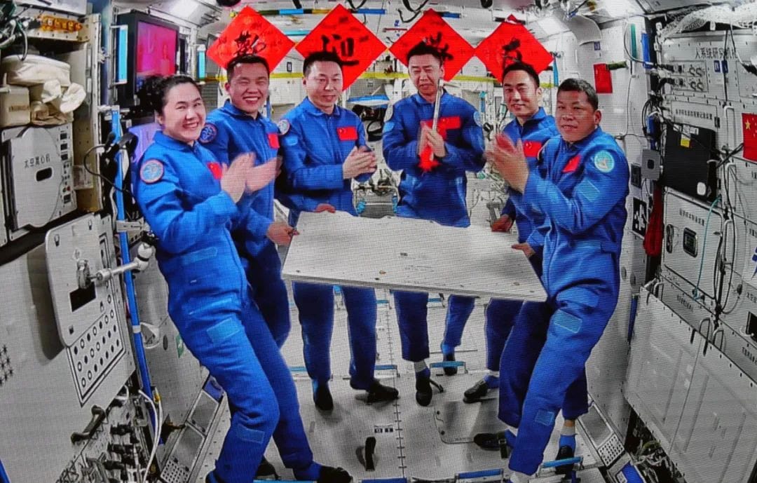 Left to Right: The Shenzhou-19 crew, Wang Haoze, Song Lingdong, and Cai Xuzhe, and the Shenzhou-20 crew, Chen Dong, Chen Zhongrui, and Wang Jie, following handover of command of the space station. ©China Manned Space Agency