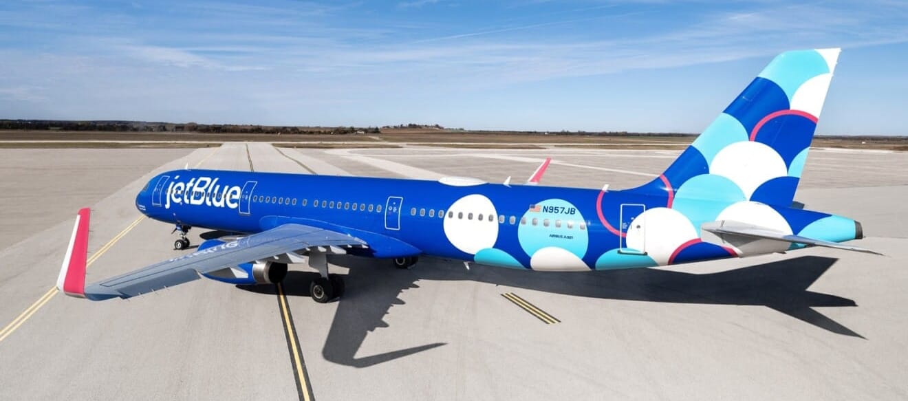 One of JetBlue's airliners with a satellite connectivity terminal ontop. ©Amazon