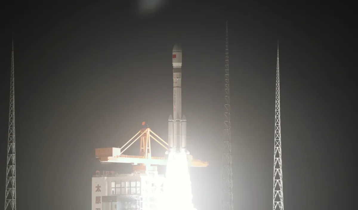 China's Long march 6A soars off the pad into the night, with satellite Yaogan-50-01 onboard