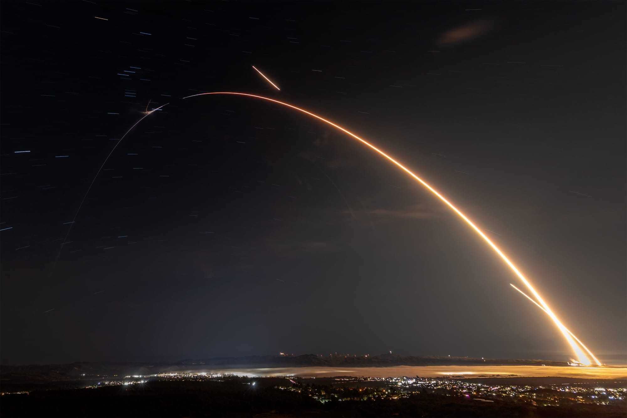 Launch trail of SpaceX's Falcon 9 with NROL-105 onboard
