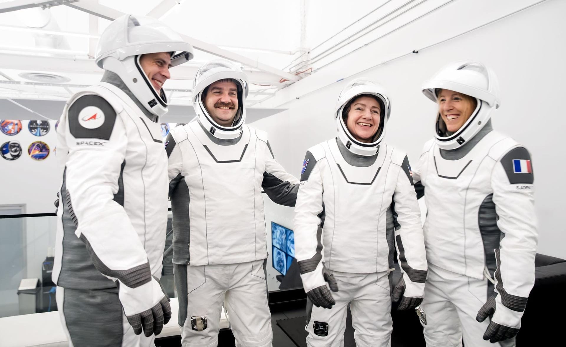 Andrey Fedyaev (left), Jack Hathaway (center left), Jessica Meir (center right), and Sophie Adenot (right) during training with the Crew Dragon spacecraft. ยฉSpaceX