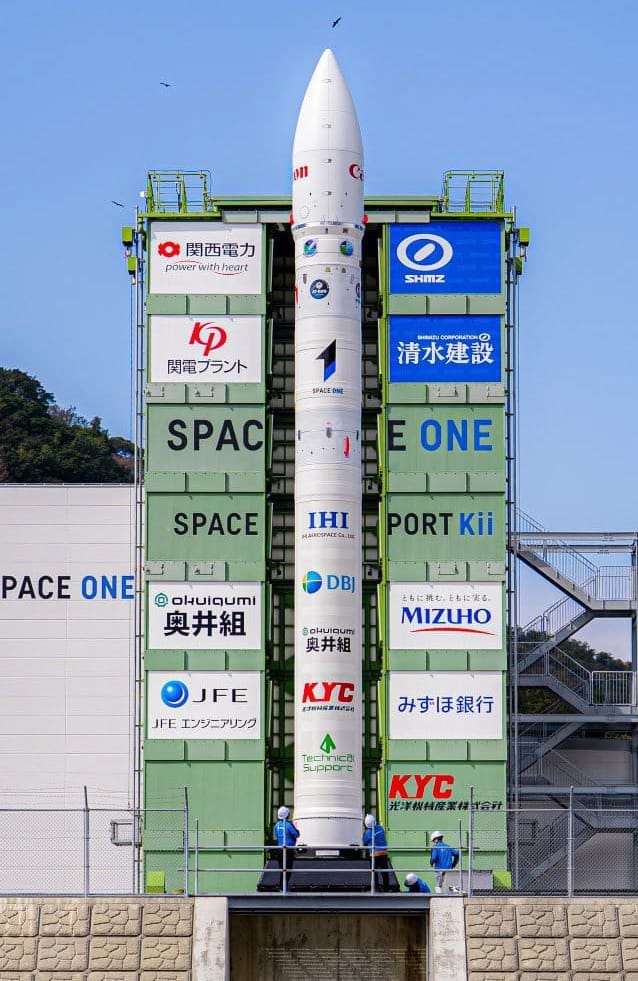 KAIROS stood at Spaceport Kii, in February 2026, with many crowdfunders on it and its integration facilities. ©Space One