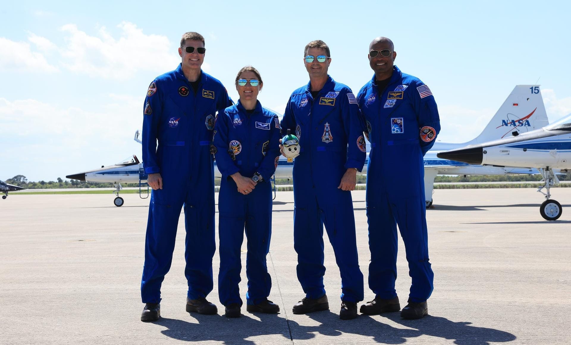 Artemis II's Jeremy Hansen (left), Christina Koch (center left), Reid Wiseman (center right), and Victor Glover (right) after arriving at the Kennedy Space Center on March 27th 2026. ยฉKim Shiflett/NASA